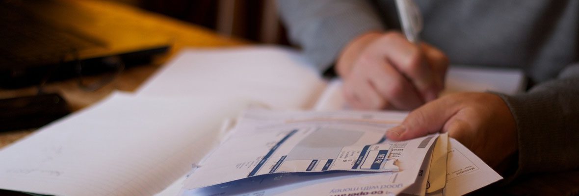 Couple reviewing financial documents together